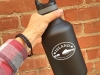 64-oz-insulated-bottle-black-in-hand