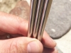 stainless-steel-straws-short-holding-by-the-rock